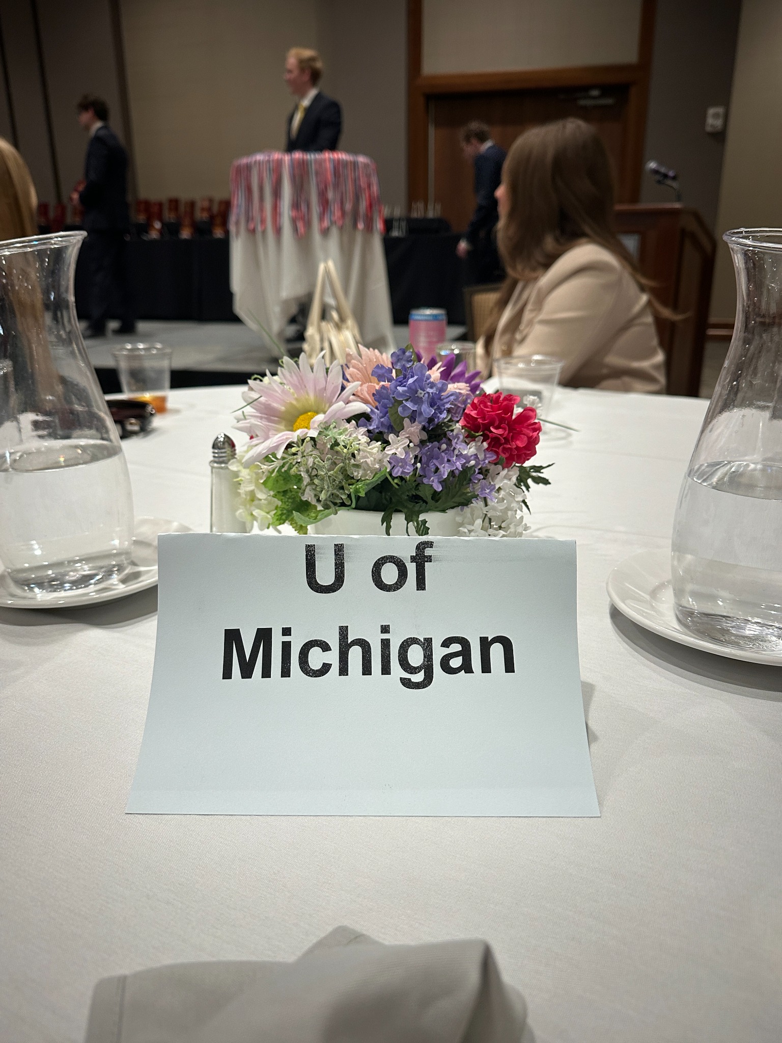 University of Michigan chapter table at the Michigan Collegiate DECA conference